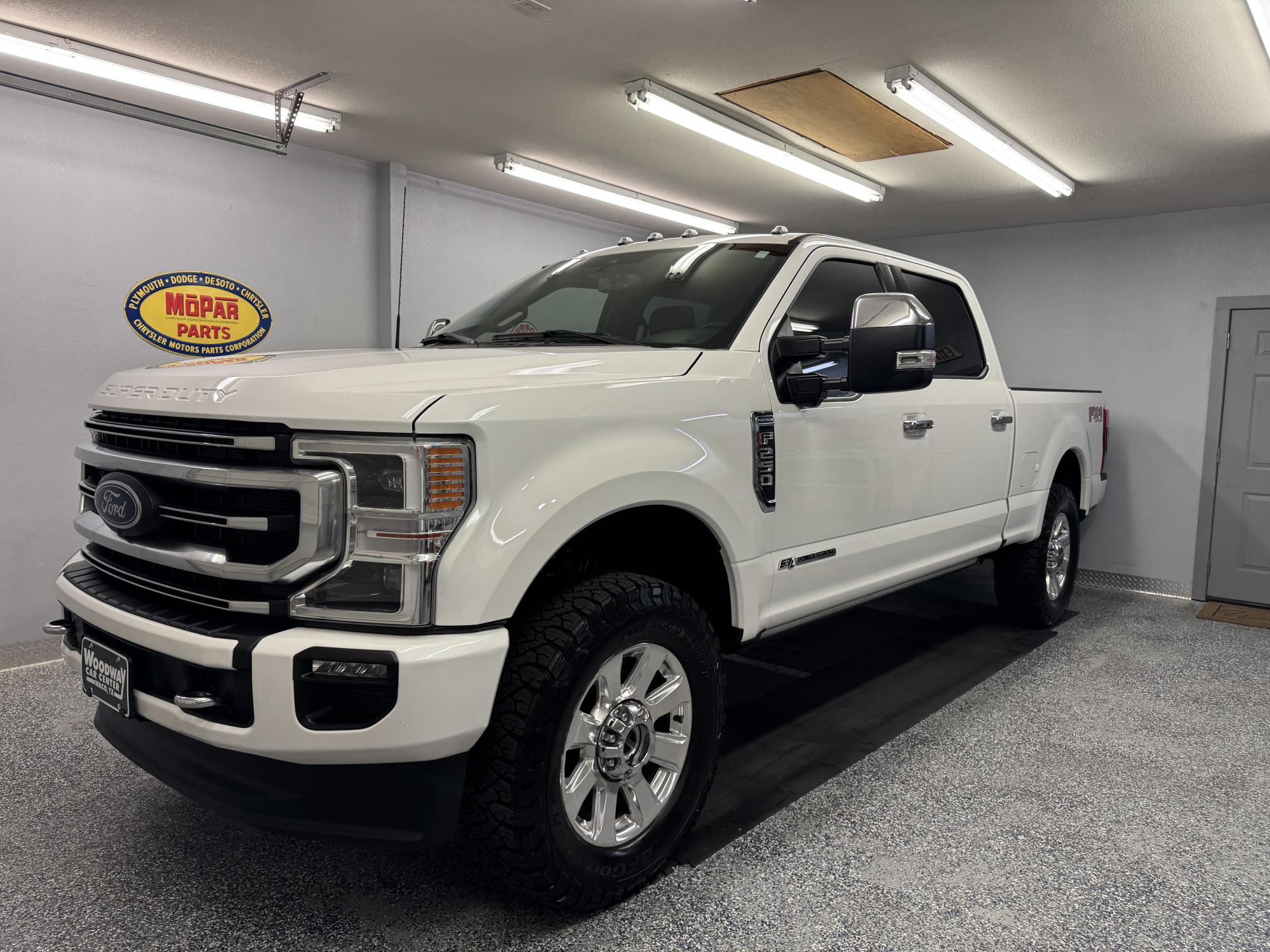 photo of 2022 Ford F-250 SuperDuty Platinum 6.7L Diesel Crew Cab 4WD Loaded Low Miles Like New!!!